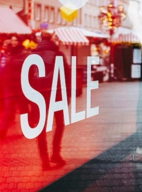 Sale window with reflections
